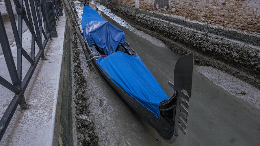 WATCH: Rare Occurrence Causes Venice's Canals To Dry Up - iHeartRadio