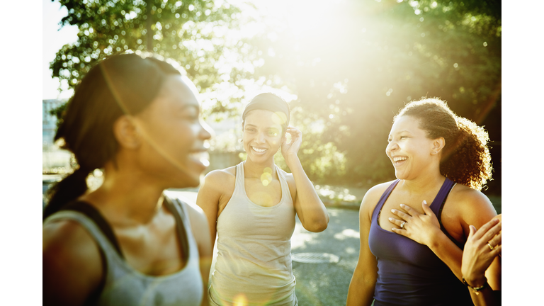 Friends laughing together after morning run