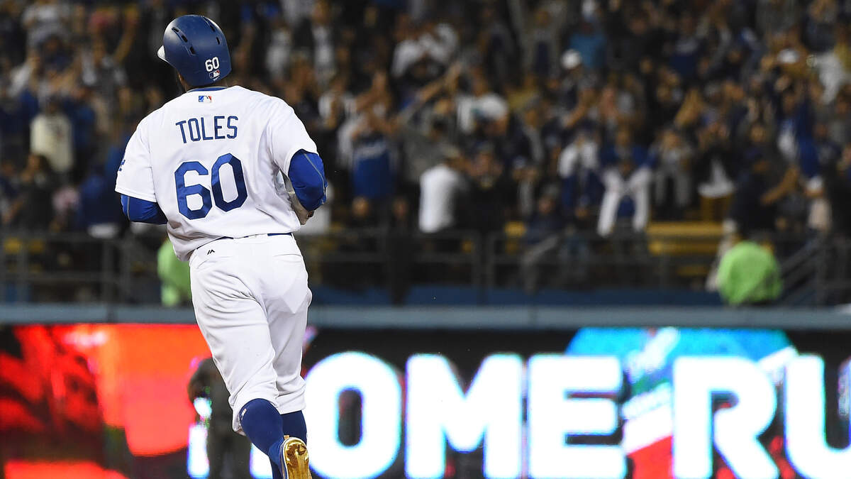 Dodgers' Andrew Toles arrested after sleeping behind Florida airport