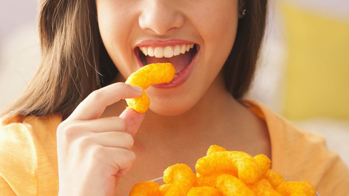 Burglar busted thanks to Cheeto dust on her teeth: cops - IAPE