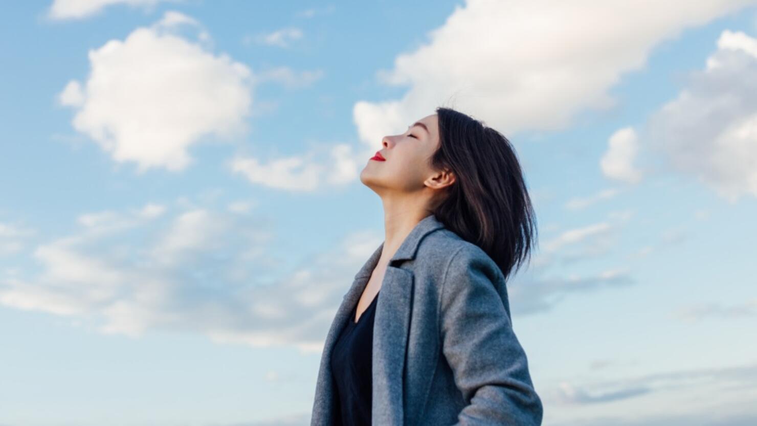 Young Lady Embracing Hope And Freedom
