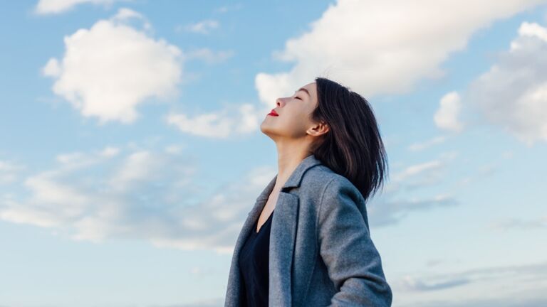 Young Lady Embracing Hope And Freedom