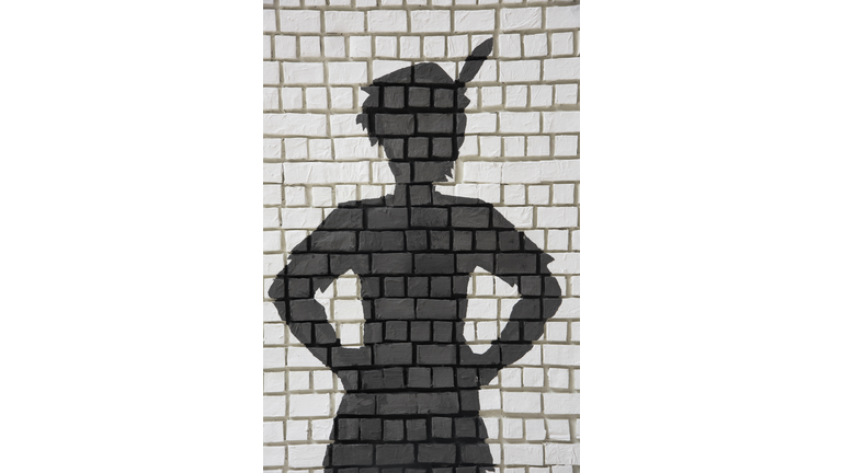 Painted silhouette Peter Pan on wall
