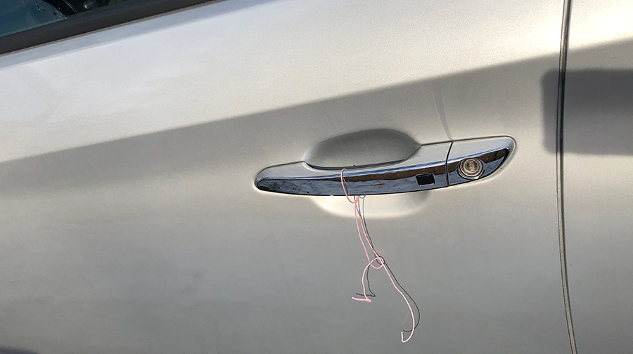 If You See A Wire Tied To Your Car Door Handle, Do Not Call The Police iHeart picture