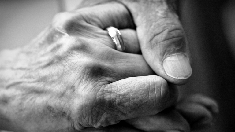 Caring Hand on Senior Hand 