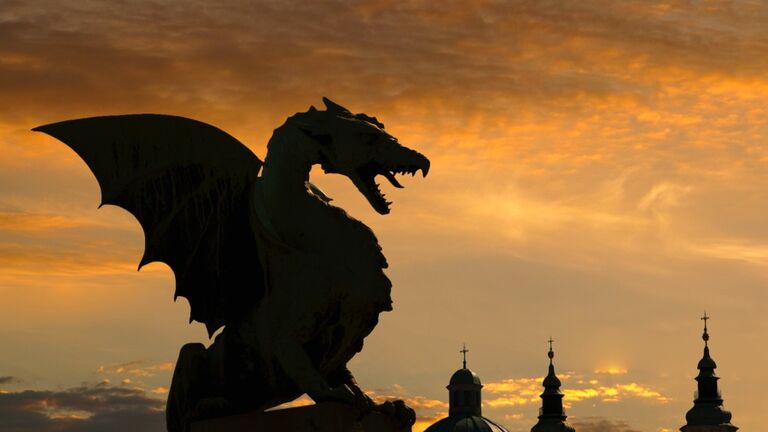 Dragon statue on Dragon Bridge over Ljublja