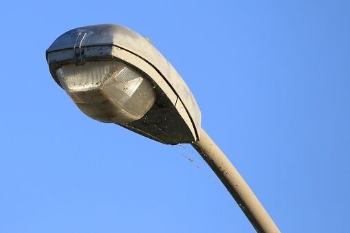 Close-up of a overhead street light on a pole