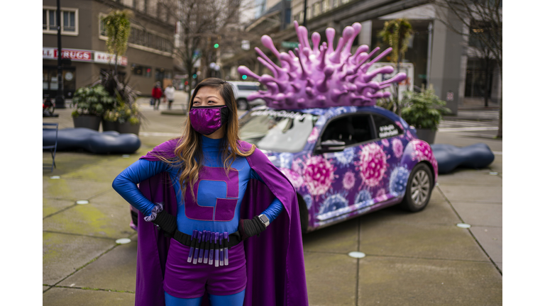 Seattle Woman Dresses As Superhero And Makes Deliveries In Covid-Themed Car