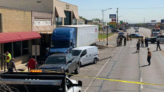 Close Call! Video Shows 18-Wheeler Nearly Missing Grand Prairie Barbershop