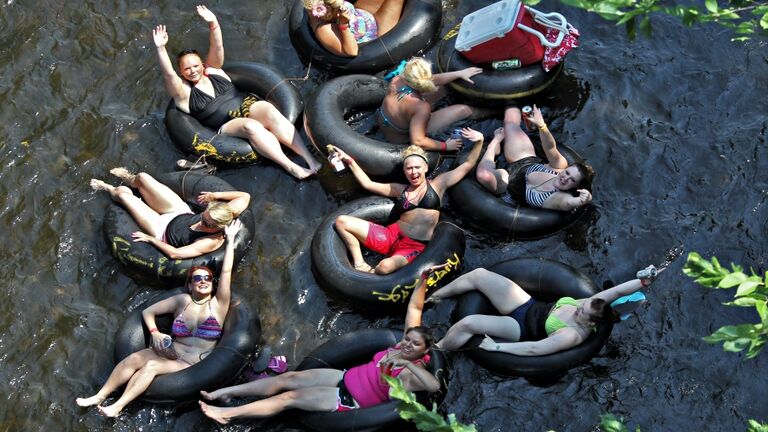 One way to beat the July swelter is to head to Somerset WI - just 15 minutes by car east of Stillwater - and tube the Apple River, as hundreds did Thursday afternoon.  (MARLIN LEVISON/STARTRIBUNE(mlevison@startribune.com (cq         )