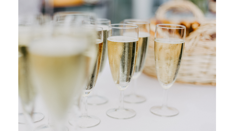 Filled champagne glasses at a party