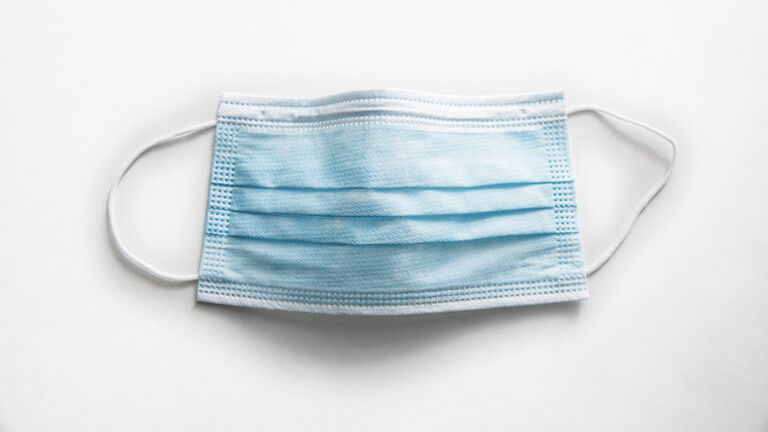 Surgical mask on white background