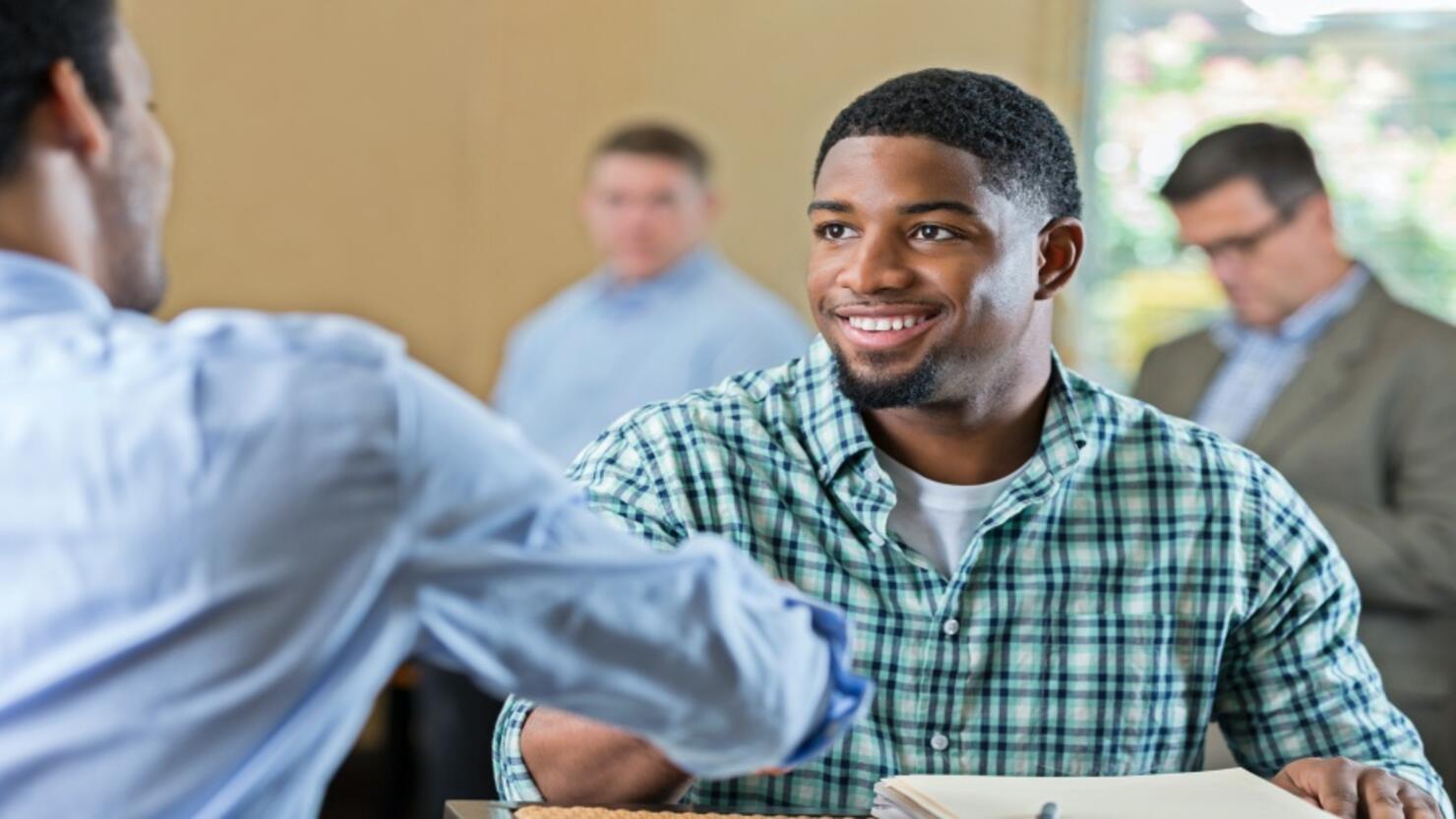 Handsome young African American man at job interview