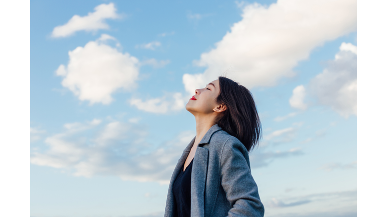 Young Lady Embracing Hope And Freedom