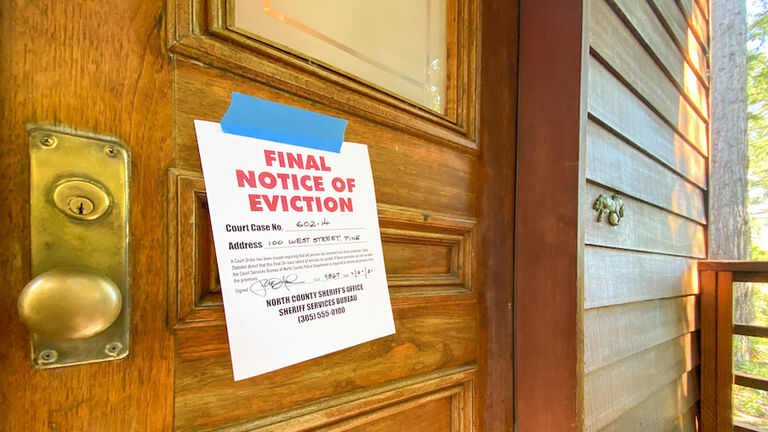 Eviction notice on door of house