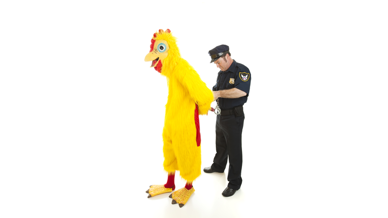 Policeman Arrests Man in Chicken Suit