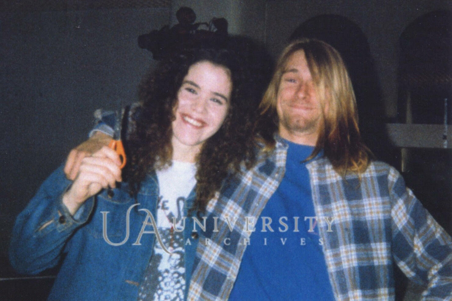 Tessa Osbourne and Kurt Cobain pose during a haircut in 1989