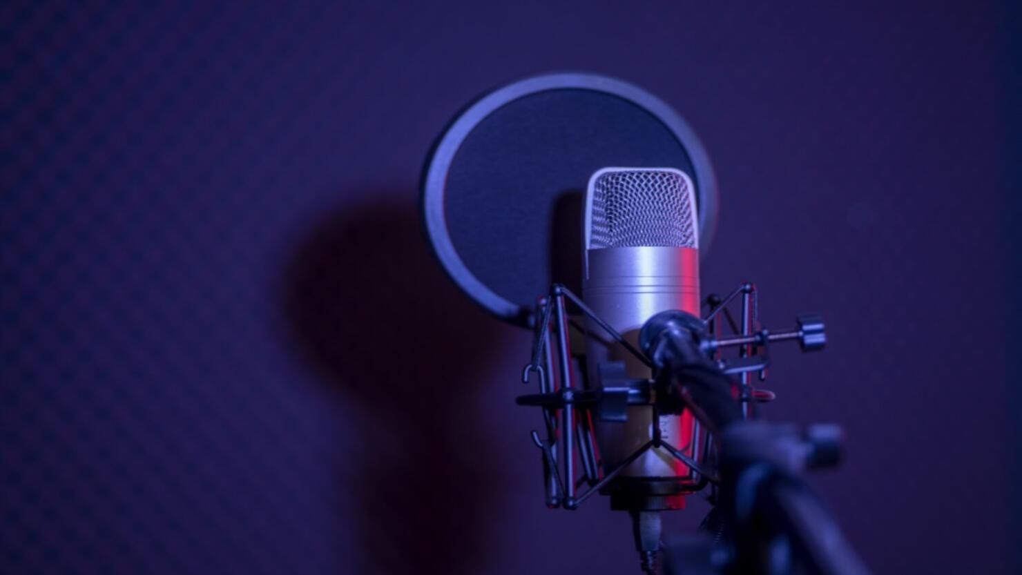 Microphone in radio station broadcasting studio.