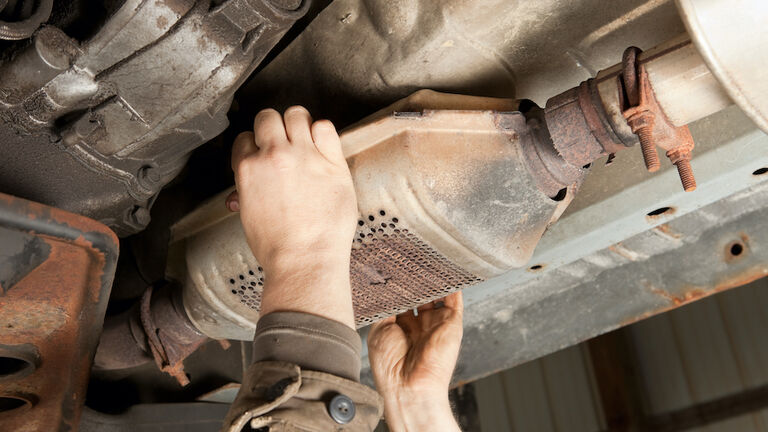 Catalytic Converter Removal at a Salvage Yard