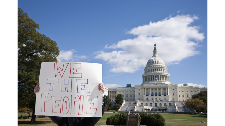 GETTY IMAGES: A protestor holding a placard in front of the US Capitol Building