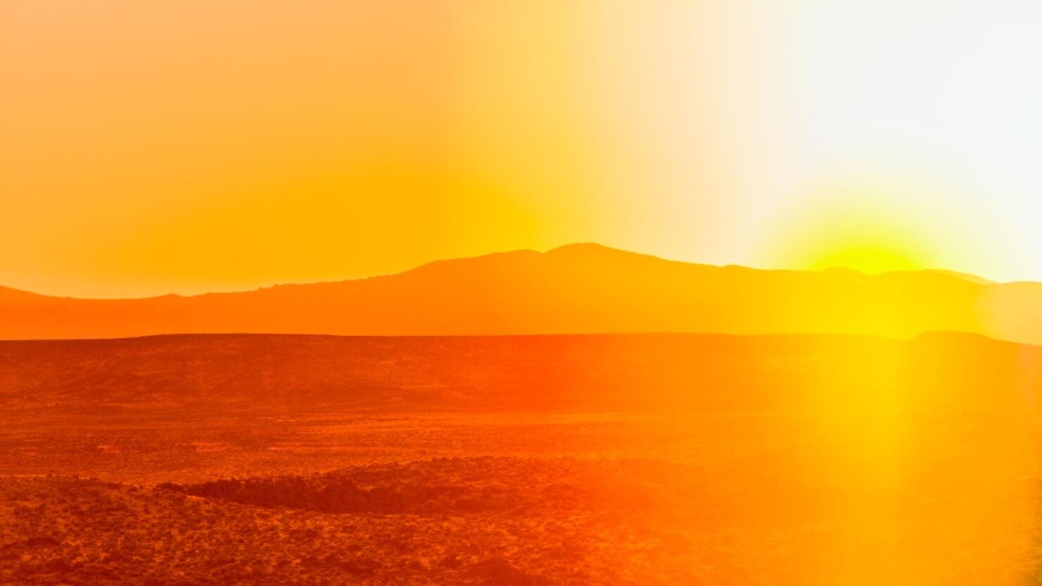 Sunset over desert landscape