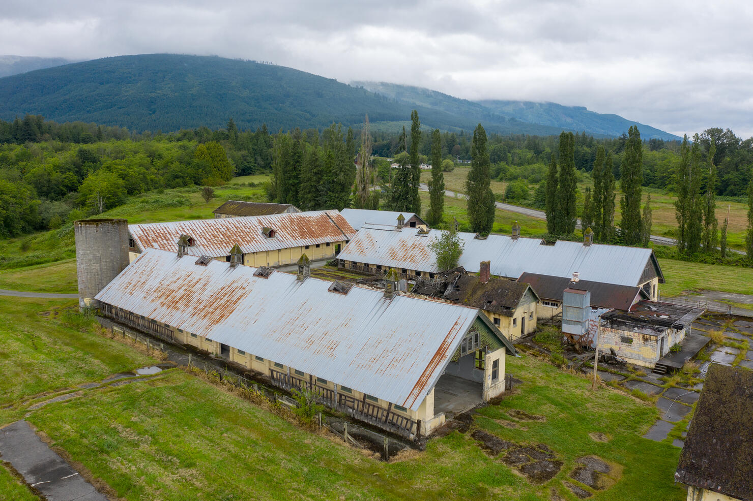 Aerial Drone View of the Northern State Mental Hospital Dairy Barns. The hospital closed in 1976. Much of the former property is now a part of Northern State Recreation Area.