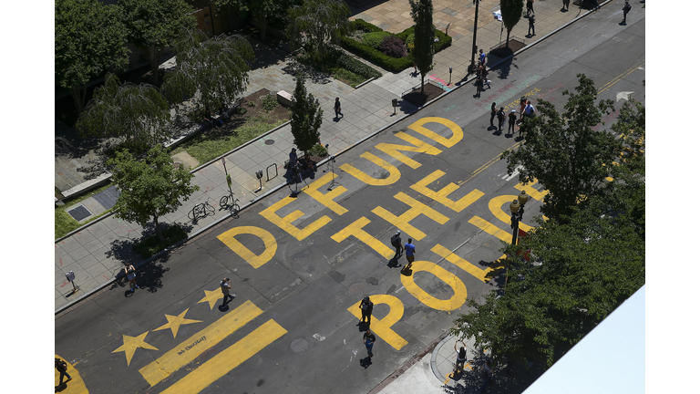 Protestors Add "Defund The Police" Messaging To Washington DC Street