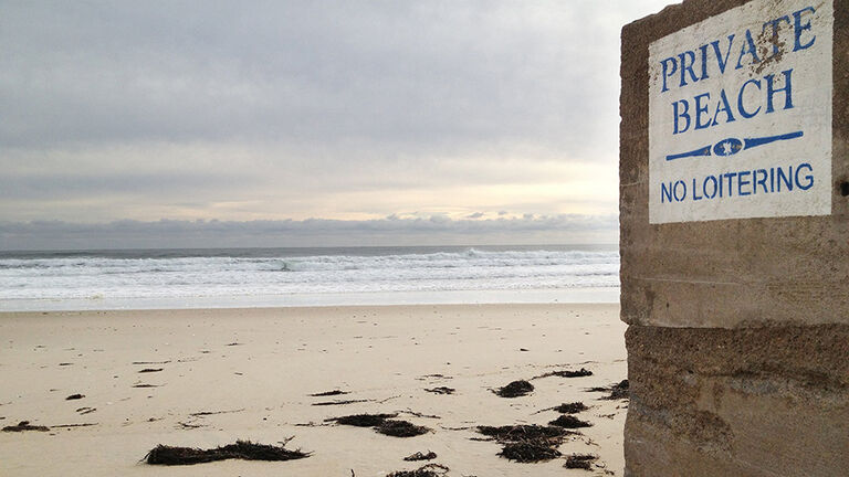 Private Beach. No tresspassing signs adorn the seawall at Moody Beach in -- Wells, where property ow