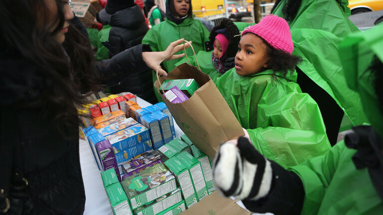 Girl Scouts Sell Cookies From Street Trucks In New York City