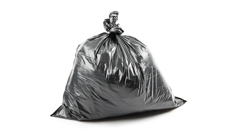 Close-Up Of Garbage Bag On White Background