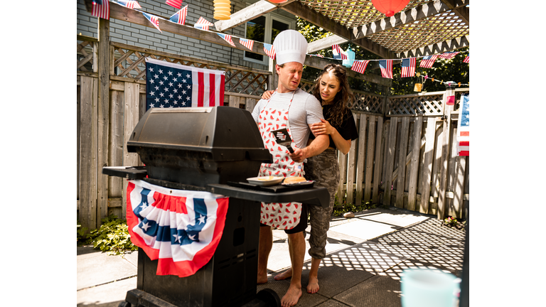 Family enjoying 4th July BBQ