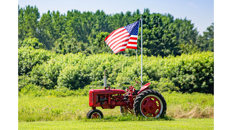 Symbols of American farming: tractor and flag