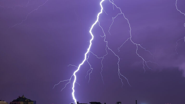 Natural real lightning over the city