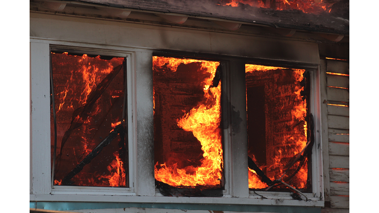 Low Angle View Of House In Fire