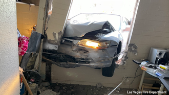 PHOTOS: Car Crashes Through The Wall Of Las Vegas Apartment Building
