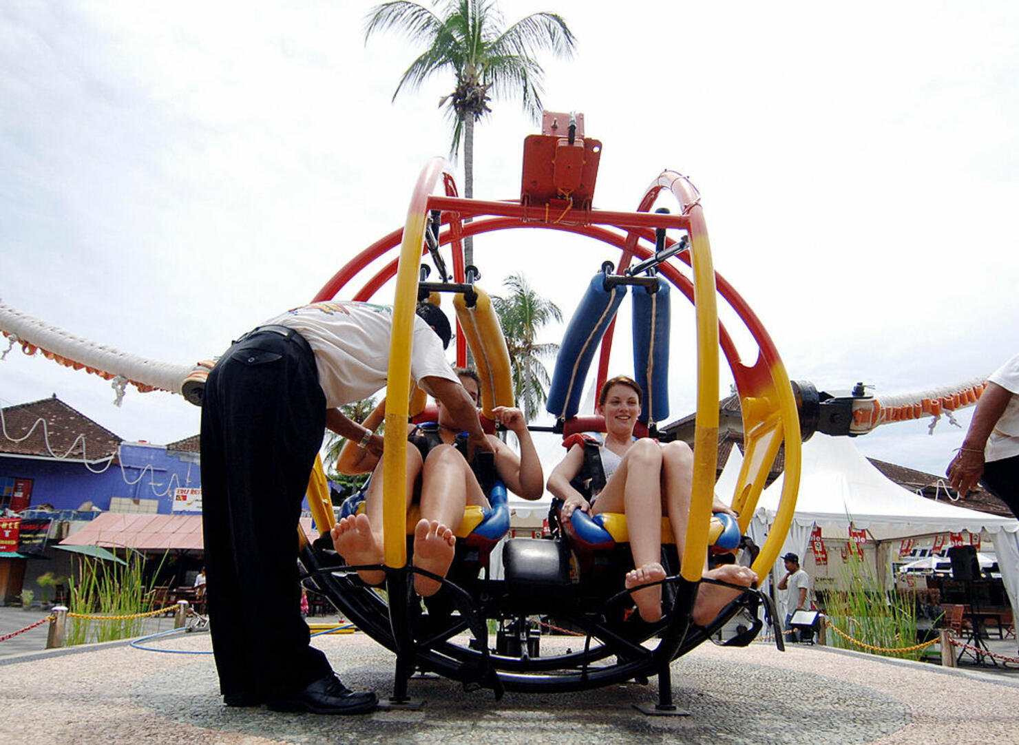 An employee of a park examines the safet