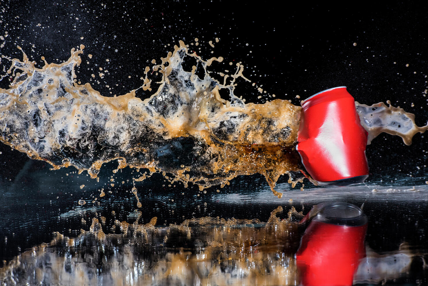 Red Tin Can Of Containing a Soft Drink Exploding