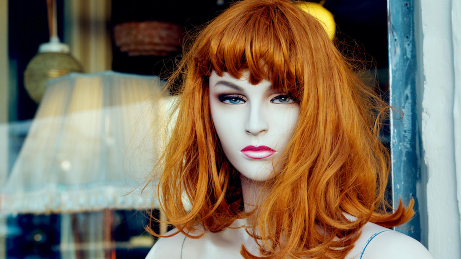 Mannequin with a red wig