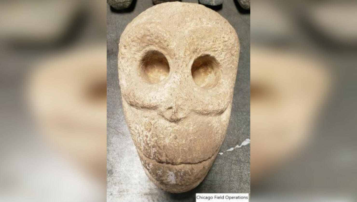 A human skull carved from stone. 