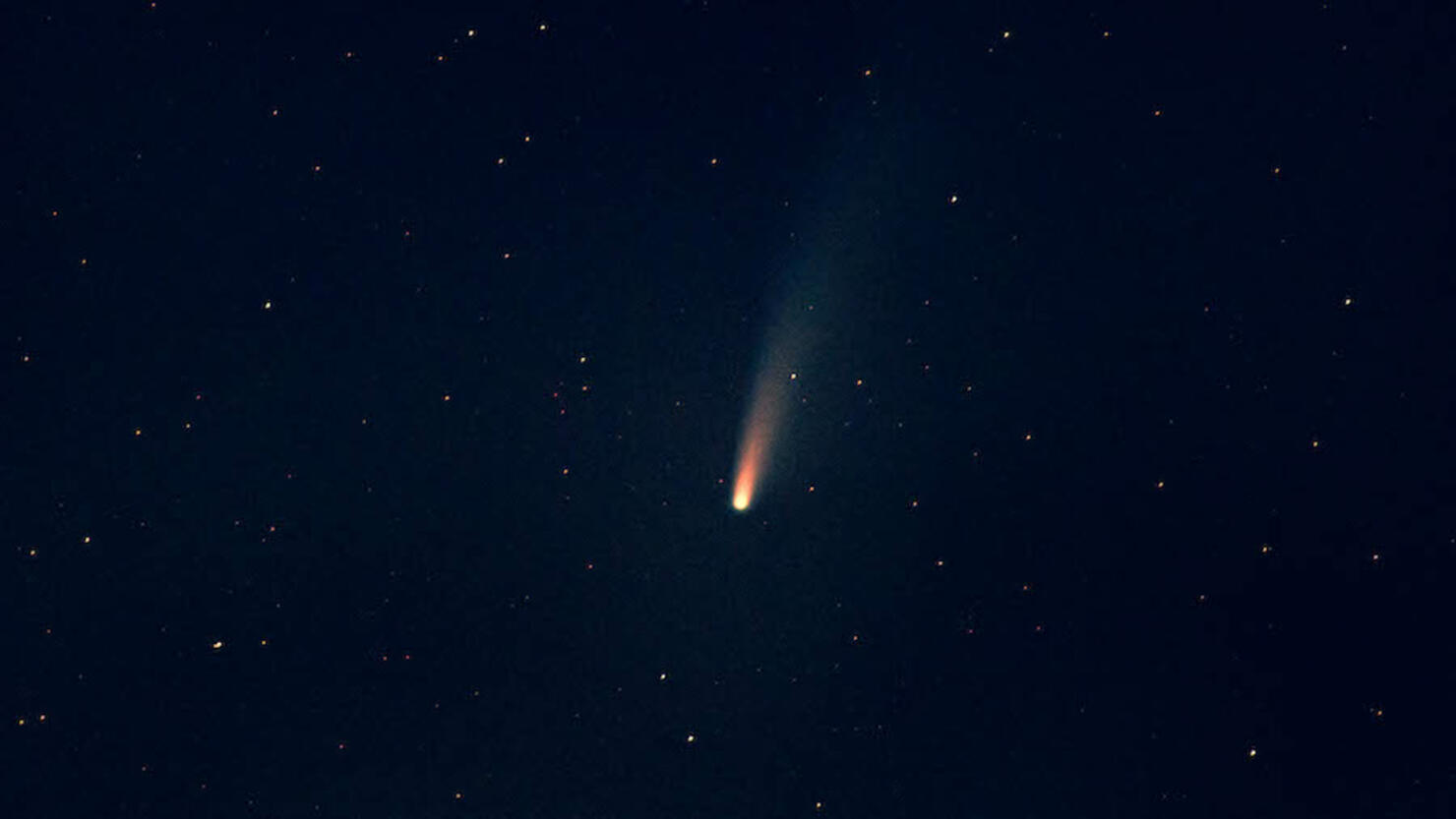 Stargazing the C/2020 F3 NEOWISE comet during night with stars.