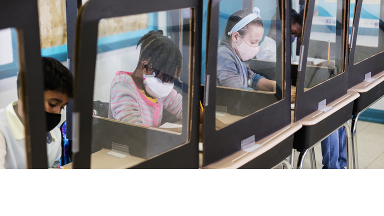 Elementary school students in class, covid-19 pandemic