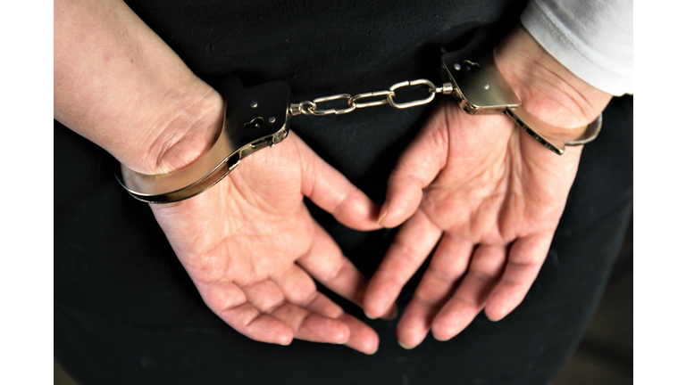 Midsection Of Man With Handcuffs