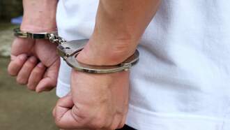 Suspect Flees While Handcuffed