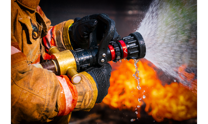 Firefighters Extinguishing House Fire.