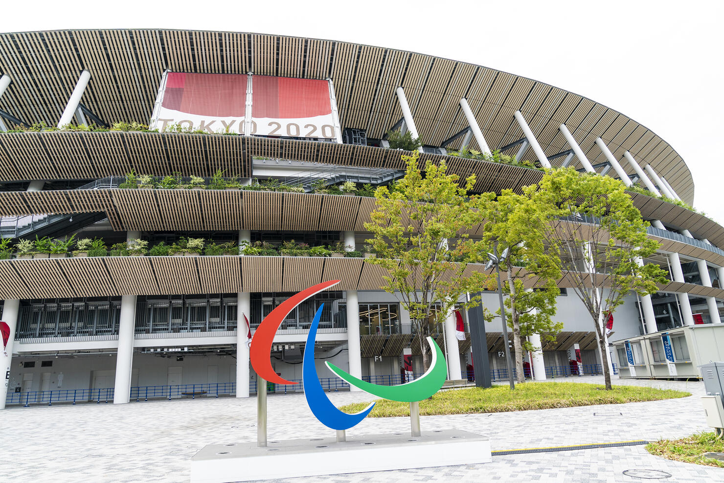 Exterior  view of Olympic stadium with sculpture of logo of