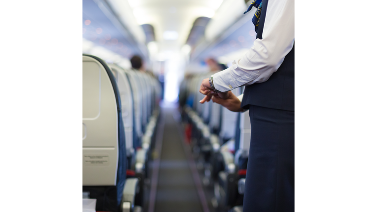 Stewardess on the airplane.