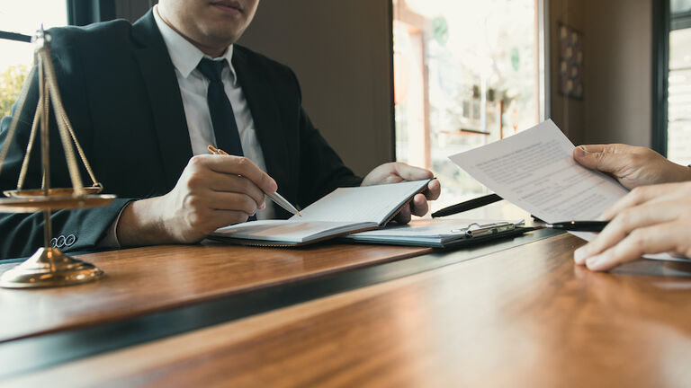 Lawyer And Customer In Office