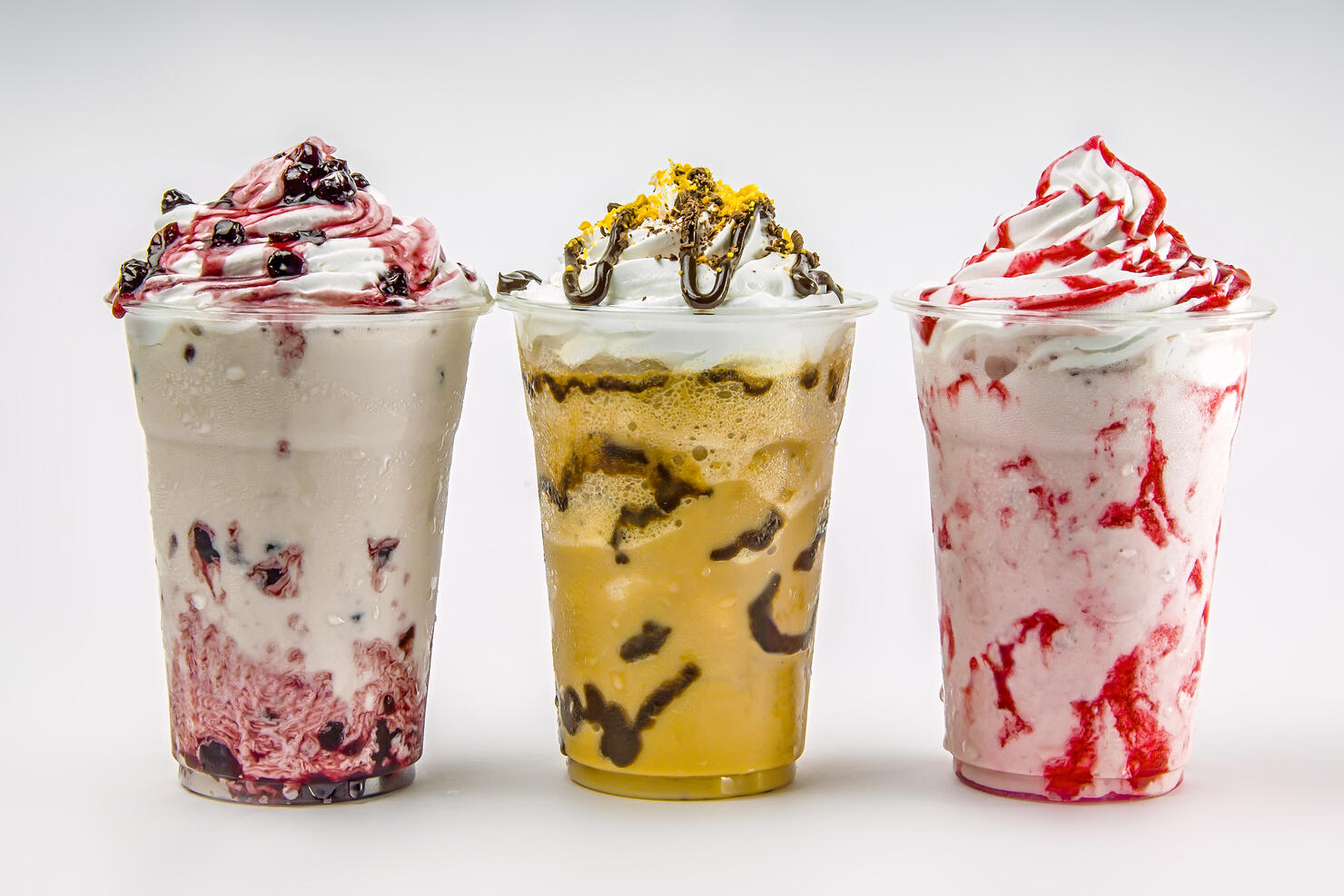 glass of frappe milkshake with milk and cherry fruit