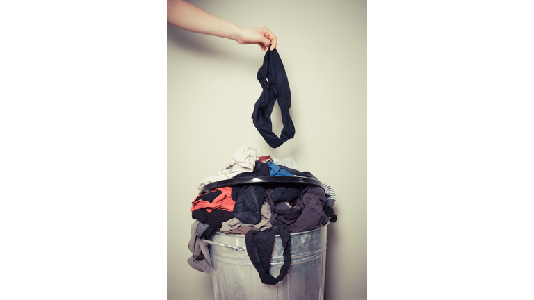 Woman sorting out her laundry