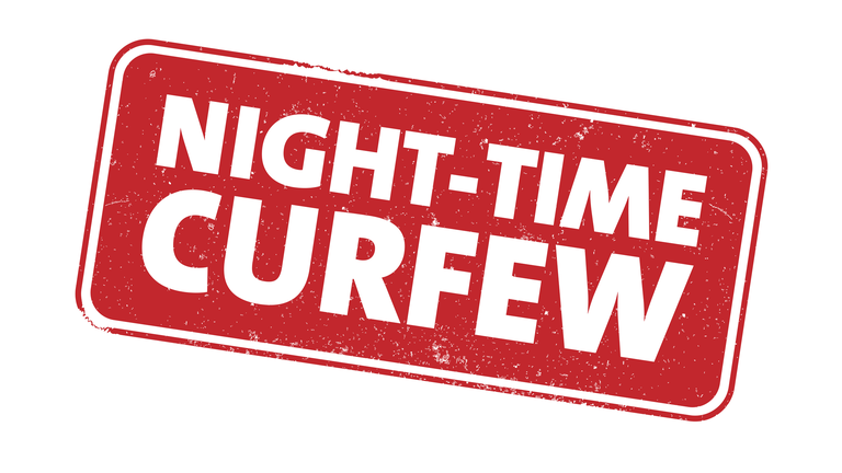 red grungy NIGHTTIME CURFEW sign or stamp